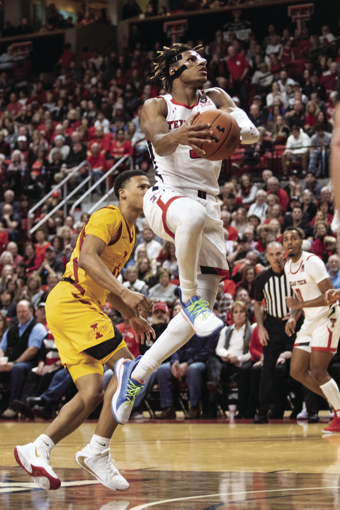 Texas Tech's Jahmi'us Ramsey goes up for a dunk against Iowa State.